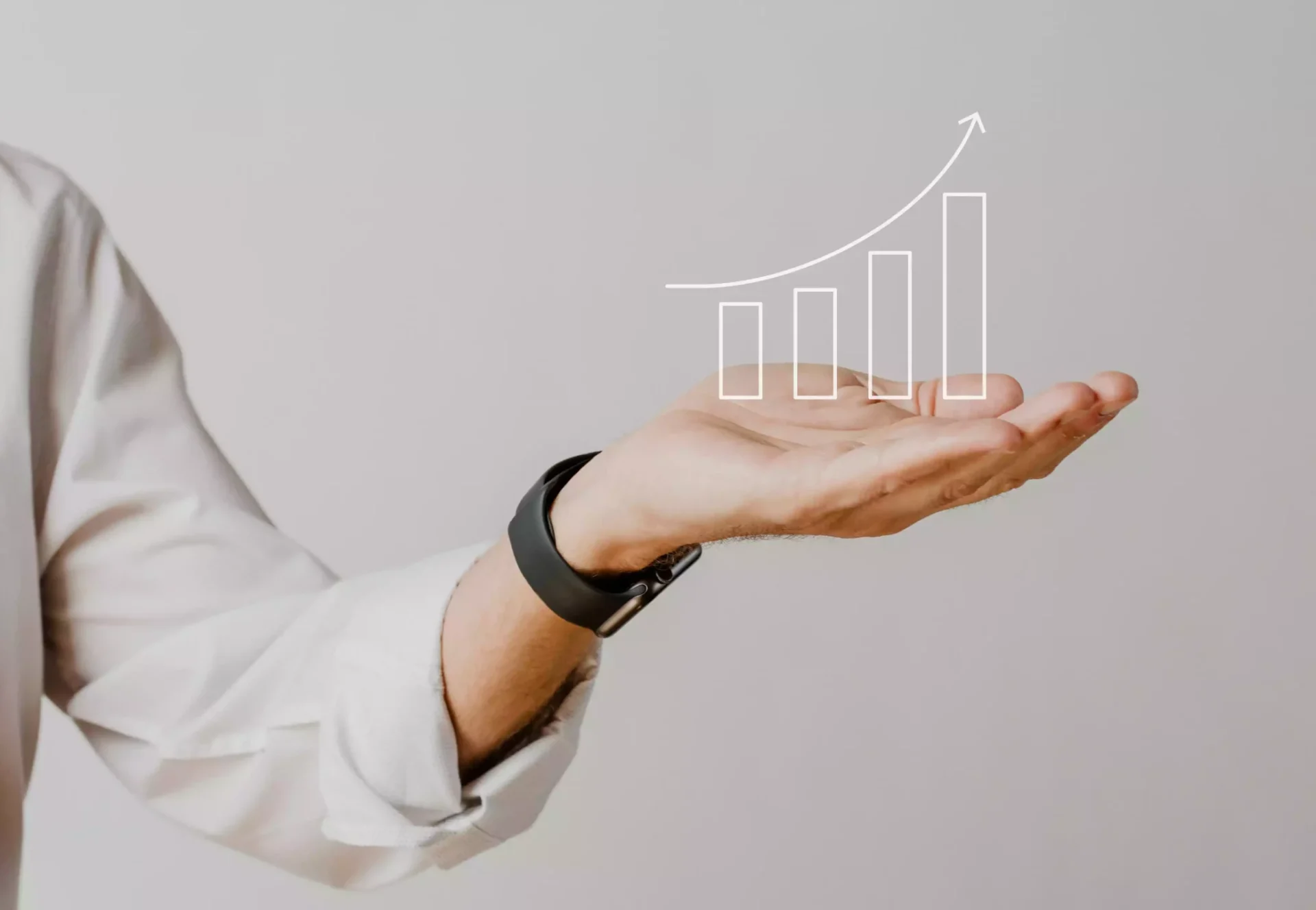 digital increasing bar graph with businessman hand overlay scaled e1725418971444